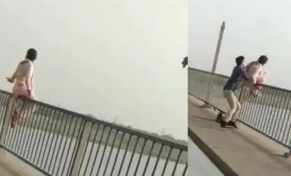 Video : बहन से कहासुनी होने पर प्रयागराज में पुल से कूदकर जान देने पहुंची युवती, लोगो ने बातों में लगाए रखा, तब ऐसे बची जान, देखें VIDEO